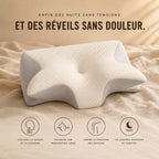 Femme détendue serrant l'oreiller ergonomique Ovéa à mémoire de forme contre sa joue